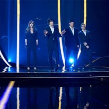 Now You See Me: Isla Fisher, Jesse Eisenberg, Woody Harrelson e Dave Franco dopo un'esibizione magica in un momento del film