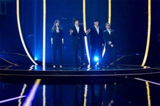 Now You See Me: Isla Fisher, Jesse Eisenberg, Woody Harrelson e Dave Franco dopo un'esibizione magica in un momento del film