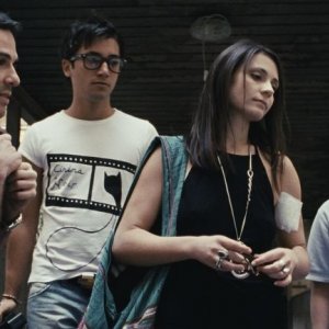 Esterno sera: Emilio Vacca con Valentina Acca e Davide Lanni in una scena