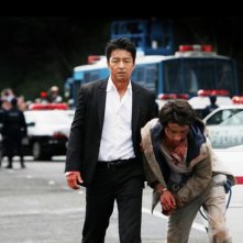 Shield of Straw: Takao Osawa con Tatsuya Fujiwara in una scena del film