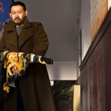 A Touch of Sin: Wu Jiang in una scena d'azione del film