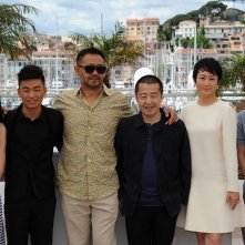 A Touch of Sin: A Touch of Sin: il regista Jia Zhang-ke con il cast del film durante il photocall a Cannes 2013