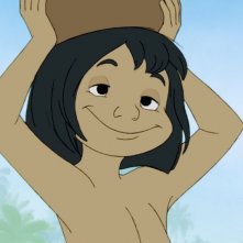 Il libro della giungla: il piccolo Mowgli sorride in una scena