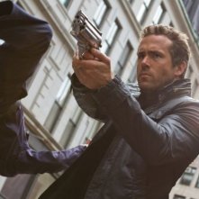 R.I.P.D.: Ryan Reynolds nei panni del poliziotto 'non morto' Nick Walker in una scena