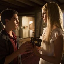 The Family: Dianna Agron e John D'Leo in una scena del film