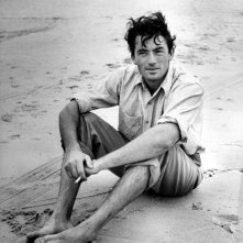 un ritratto di Gregory Peck in spiaggia