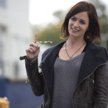 Il mondo di Arthur Newman: Emily Blunt sorridente in una scena del film