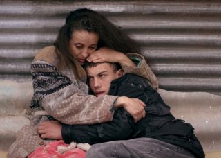 The Rooftops: Amal Kateb in una scena tratta dal film di Merzak Allouache