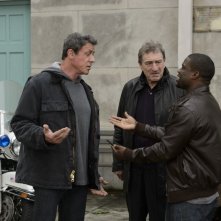 Il Grande Match: Robert De Niro, Sylvester Stallone e Kevin Hart discutono animatamente in una scena