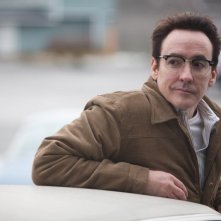 John Cusack in una scena del film Il cacciatore di donne