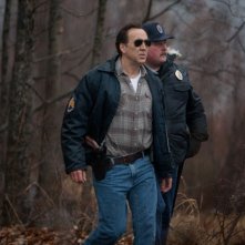 Nicolas Cage in azione in una scena del thriller Il cacciatore di donne