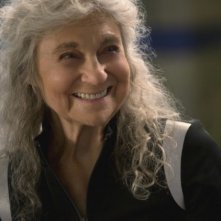 Hunger Games: la ragazza di fuoco - Un primo piano della sorridente Lynn Cohen