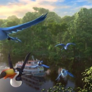 Rio 2: Blu e Jewel con i loro ragazzi e i loro amici in volo in una scena del film