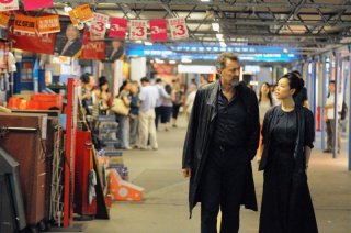 Something Good: Luca Barbareschi con Zhang Jingchu in una scena del thriller