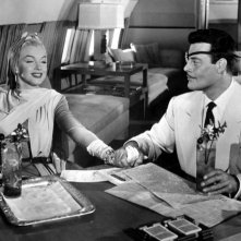 Marilyn Monroe in Come sposare un milionario accanto ad Alexander D'Arcy