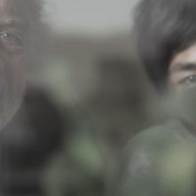 Se chiudo gli occhi non sono più qui: Giorgio Colangeli e Mark Manaloto in una scena