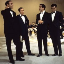 Quattro icone della televisione italiana: Mike Bongiorno, Corrado, Pippo Baudo ed Enzo Tortora.