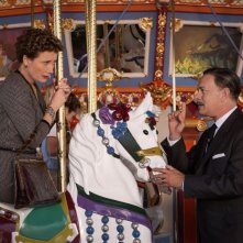 Saving Mr. Banks: Tom Hanks sulla giostra con Emma Thompson in una scena del film