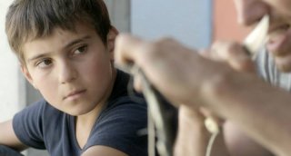 Macondo: il piccolo Ramasan Minkailov, protagonista del film in una scena