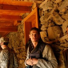 Tim Hetherington: dalla linea del fronte, il fotografo di guerra Tim Hetherington in una scena