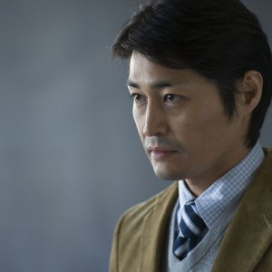 HK: Forbidden Super Hero - Un primo piano di Ken Yasuda