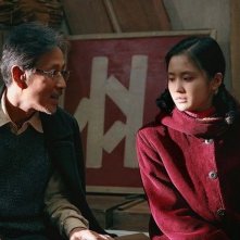 Coming home: Chen Daoming con Zhang Huiwen in una scena