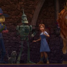 Il magico mondo di Oz: Dorothy con i suoi tre inseparabili compagni di viaggio in una scena