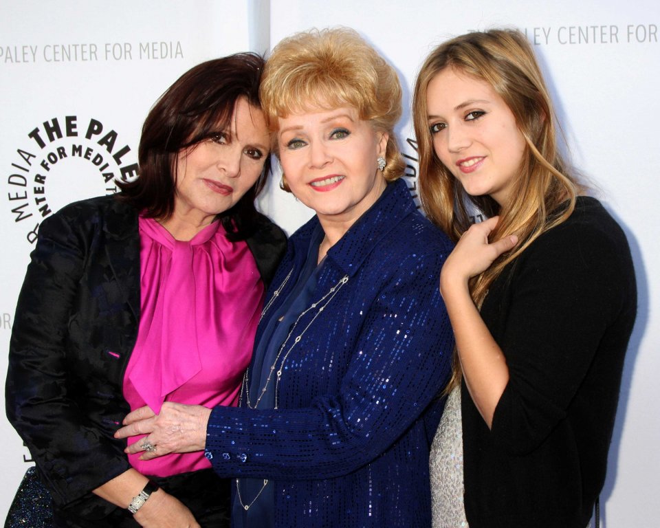 Carrie Fisher con la madre Debbie Reynolds e la figlia Billie Lourd.