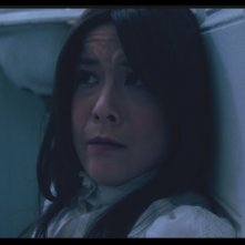 I Am a Ghost: Anna Ishida in un inquietante primo piano del film di H.P. Mendoza
