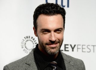 Una foto di Reid Scott.