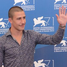 Venezia 2014: Giuseppe Fumo posa al photocall di Anime nere