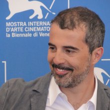 Venezia 2014: il regista Francesco Munzi posa al photocall di Anime nere