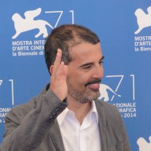 Venezia 2014: Francesco Munzi posa al photocall di Anime nere