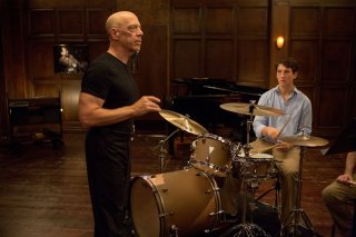 Whiplash: Miles Teller insieme a J.K. Simmons in una scena del film