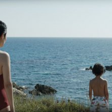 Last Summer: Rinko Kikuchi con il piccolo Ken Brady in una scena del film