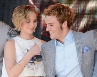 Hunger Games - Il canto della rivolta parte 1: Jennifer Lawrence e Sam Claflin durante il tour promozionale