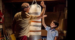 Bill Murray insieme a Jaeden Lieberher in una scena di St. Vincent
