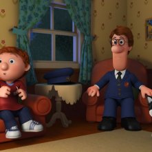 Postino Pat - Il Film: Pat con il piccolo Julian e il gatto Jesse in una scena del film