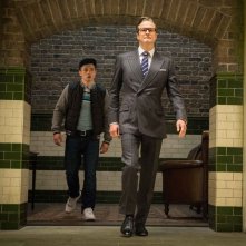 Kingsman: Secret Service, Colin Firth insieme a Taron Egert in un momento del film