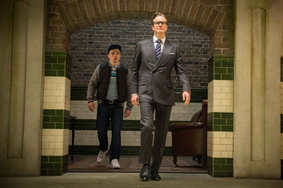 Kingsman: Secret Service, Colin Firth insieme a Taron Egert in un momento del film
