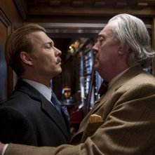 Mortdecai: Johnny Depp con Michael Culkin in una scena del film