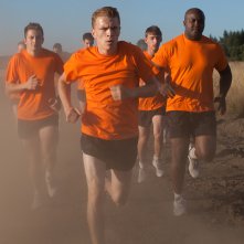 The Fighters - Addestramento di vita: allenamento in spiaggia per Kévin Azaïs in una scena del film