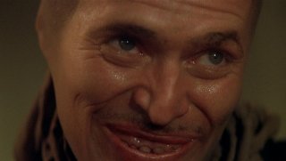 Cuore selvaggio: un inquietante primo piano di Willem Dafoe