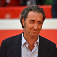 Roma 2015: Paolo Sorrentino sorride ai fotografi sul red carpet