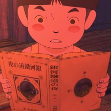 Giovanni's Island: il piccolo protagonista intento a leggere