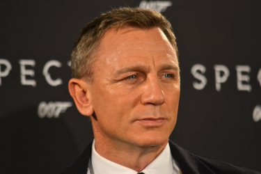 Daniel Craig sorridente al photocall di Spectre
