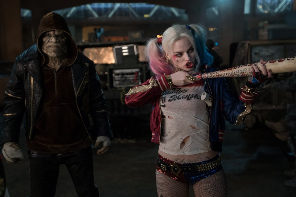 Suicide Squad: Adewale Akinnuoye-Agbaje and Margot Robbie in a photo from the film