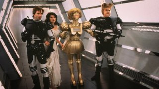 Bill Pullman, Daphne Zuniga, John Candy in una scena del film Balle Spaziali
