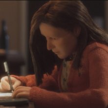 Anomalisa: la protagonista femminile del film animato intenta a scrivere