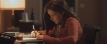 Anomalisa: la protagonista femminile del film animato intenta a scrivere